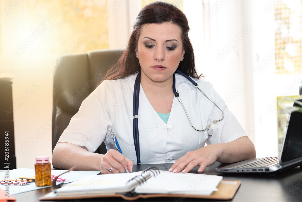 Portrait of young female doctor, light effect Portrait of young female doctor, light effect