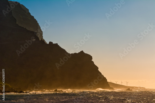 Picturesque wind turbines on the Atlantic coast on sunset background, Tenerife island, Canary Islands, Spain