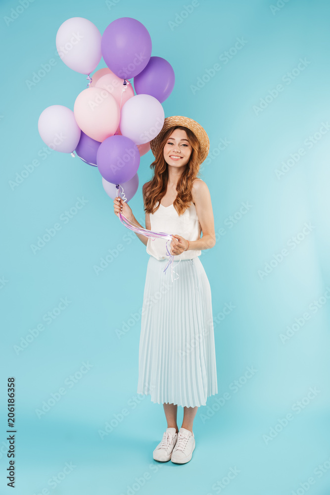 Happy caucasian woman holding balloons. Happy caucasian woman holding balloons.