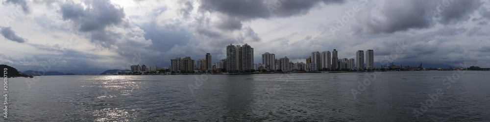 City with buildings and beach at the same time, Guaruja city, South America, Brazil