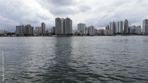 City with buildings and beach at the same time, Guaruja city, South America, Brazil © Ranimiro