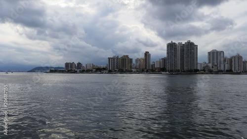 City with buildings and beach at the same time, Guaruja city, South America, Brazil
