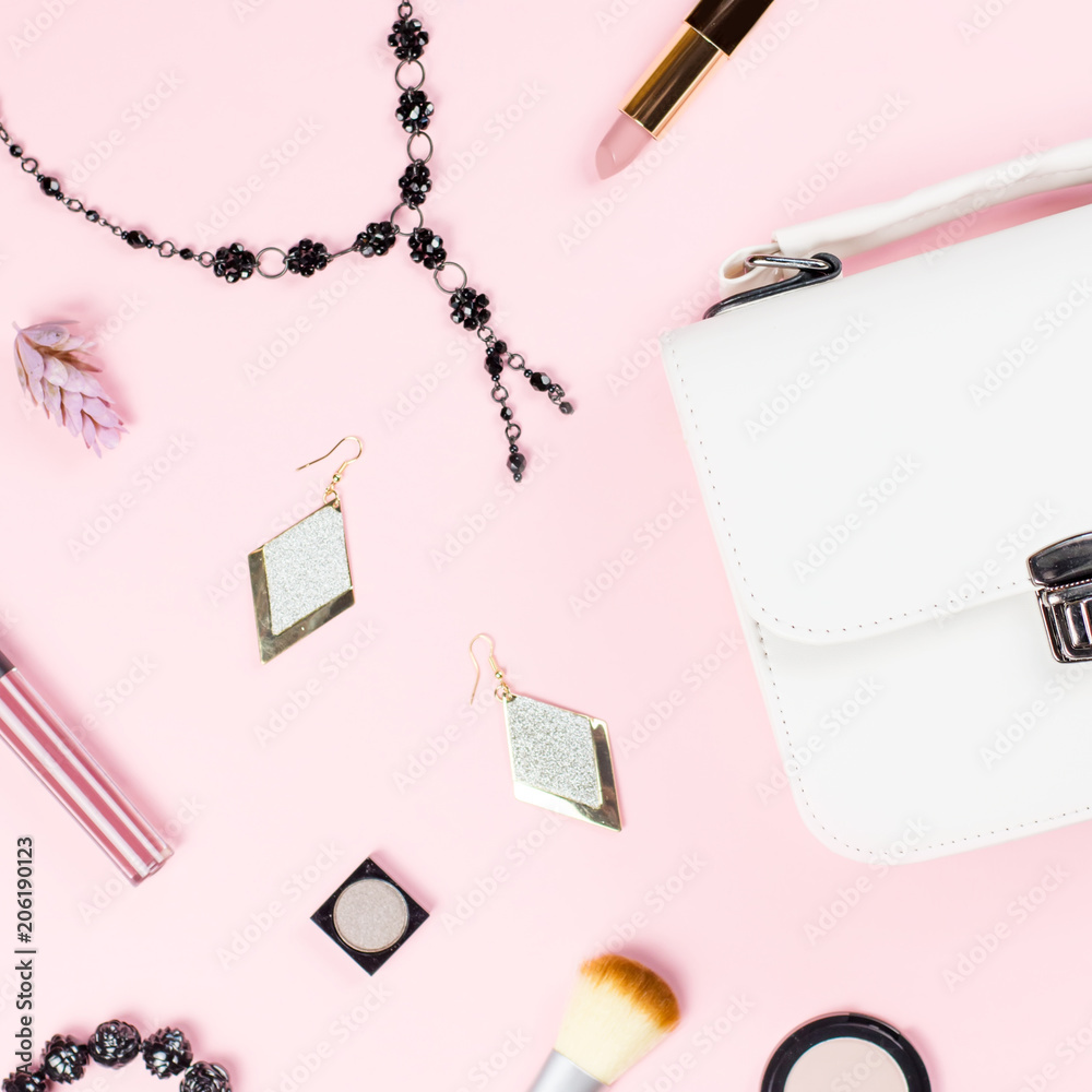 woman beauty accessories flat lay on pastel background. Fashion or beauty blogger concept. woman beauty accessories flat lay on pastel background. Fashion or beauty blogger concept.