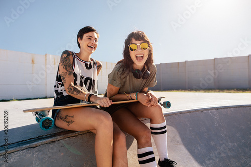 Female friends enjoying a day at skate park