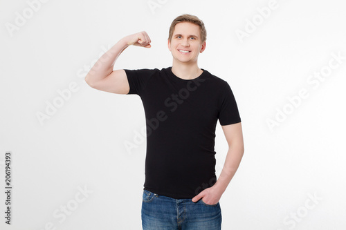 Strong Young man wearing blank t-shirt isolated on white background. Copy space. Place for advertisement. Front shirt view. Summer clothes