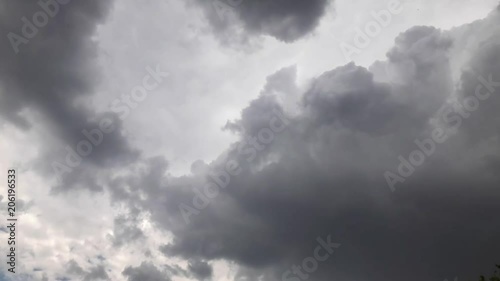 Light in the Dark and Dramatic Storm Clouds photo