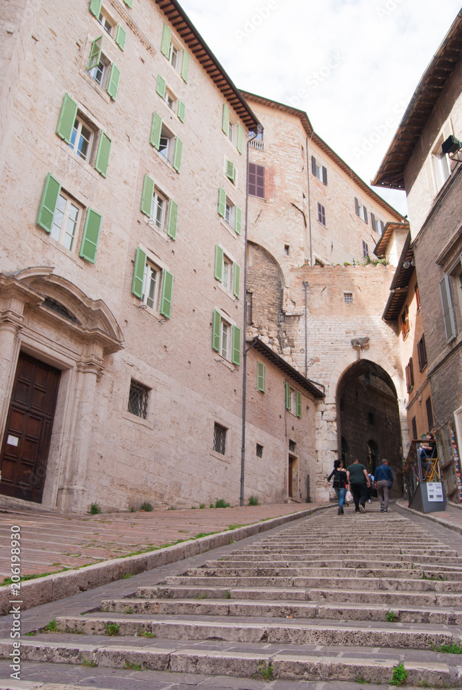 Long and climbing staircase in a street of Perugia