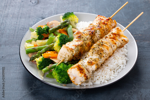 Chicken skewers with steamed vegetables and long rice