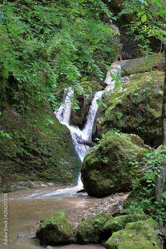 Waterfall in the forest. photo