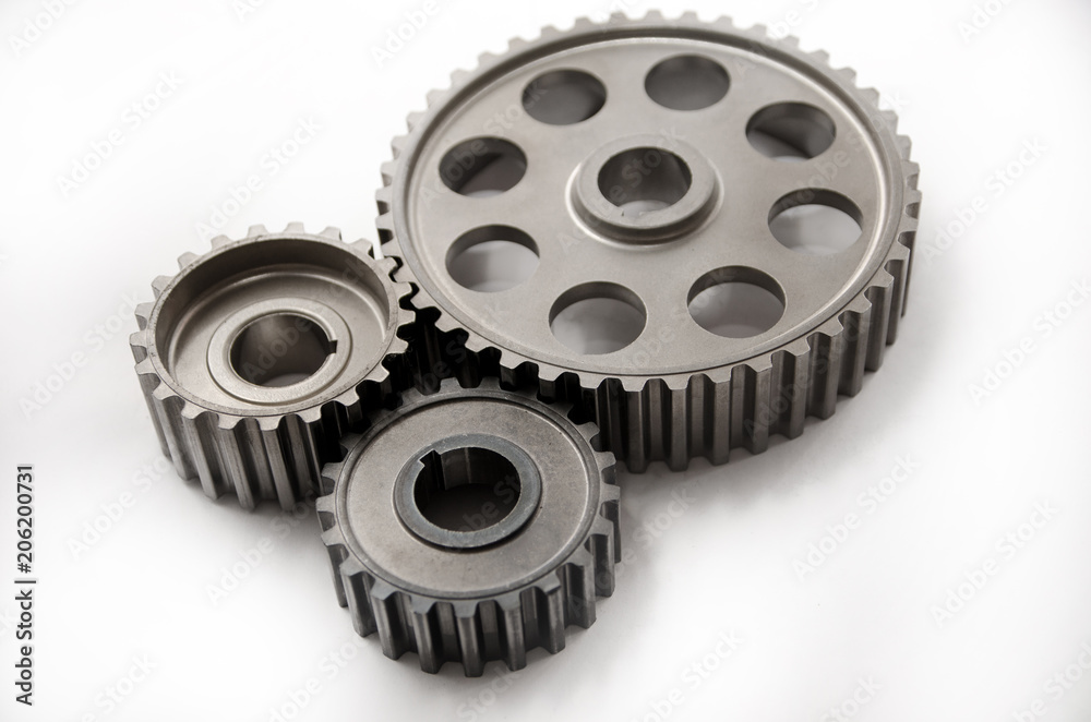 A gear wheel or pinion is a basic part of a gear train in the form of a disc with teeth on a cylindrical or conical surface meshing with the teeth of another gear A gear wheel or pinion is a basic part of a gear train in the form of a disc with teeth on a cylindrical or conical surface meshing with the teeth of another gear