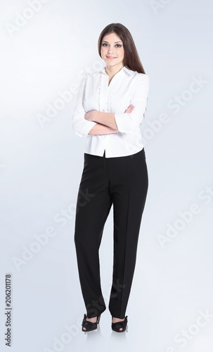 in full growth.portrait of young business woman .isolated on white