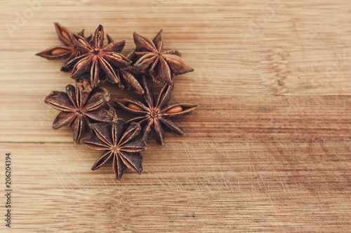 Close up of star anise on wooden board