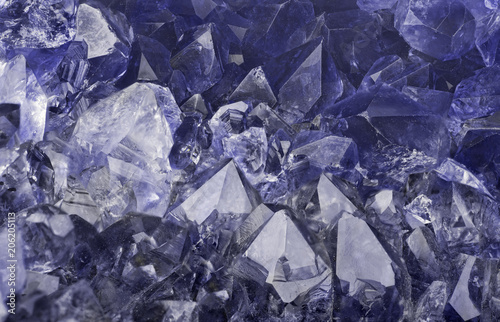 dark blue sapphire crystals closeup backgrond