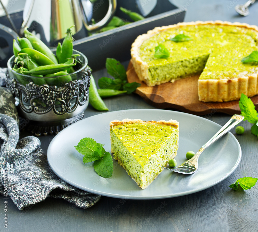 Homemade tart with green peas, bacon and cheese. Homemade tart with green peas, bacon and cheese.