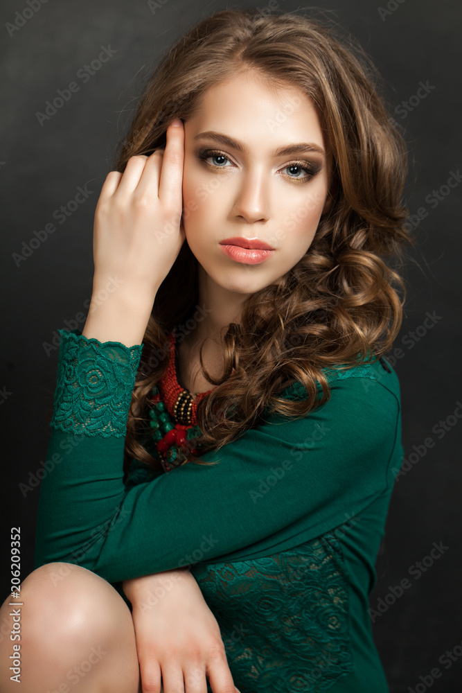 Fototapeta premium Glamorous Woman Posing on Blackboard Background, Fashion Portrait