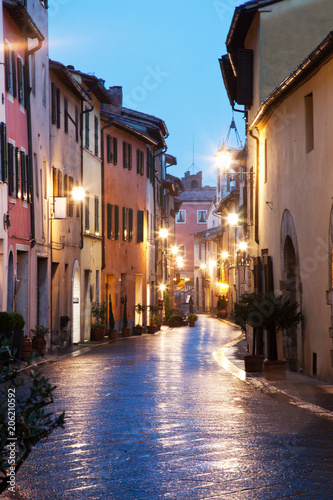 streets at night in San Quirico d'Orcia after rain, Tuscany, Italy