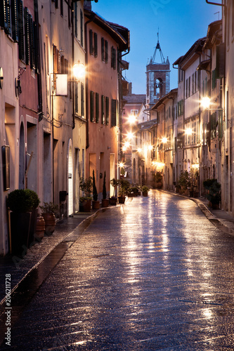 streets at night in San Quirico d'Orcia after rain, Tuscany, Italy