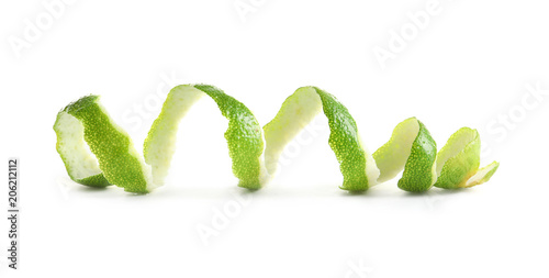 Peel of fresh ripe lime on white background