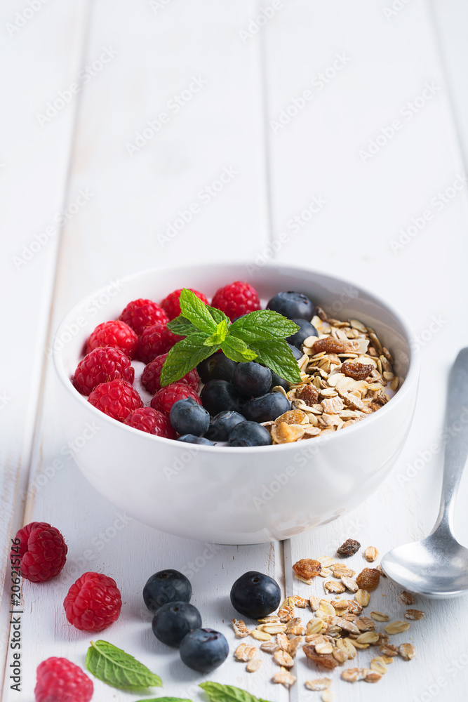 Smoothie bowl with yogurt, fresh berries and cereal Smoothie bowl with yogurt, fresh berries and cereal
