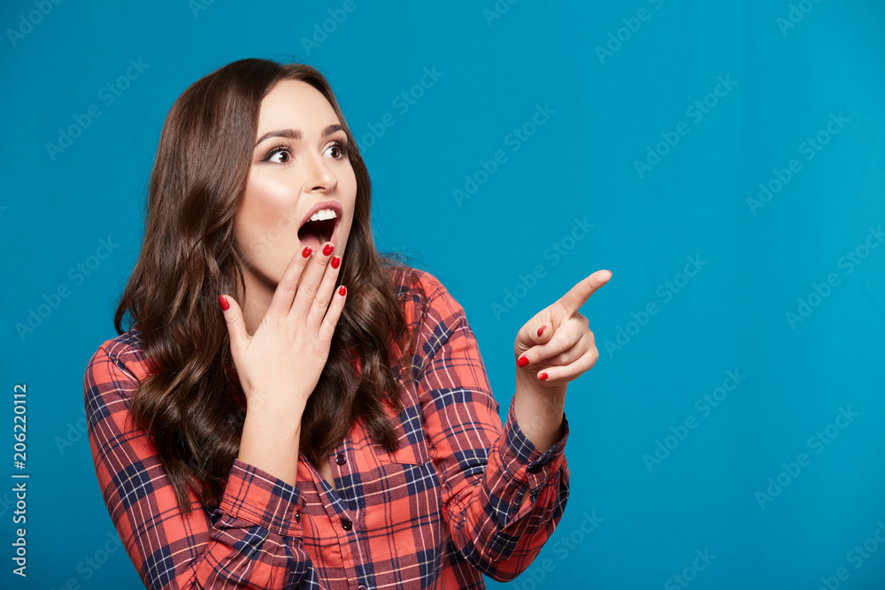 Fototapeta premium Beautiful model at blue background