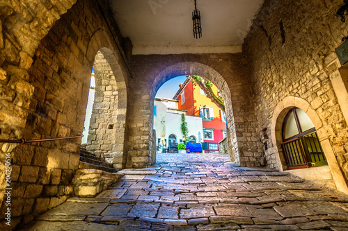 Motovun old streets town. / Scenic view at old stone streets in city center of Motovun town, Istria region in Croatia. © dreamer4787