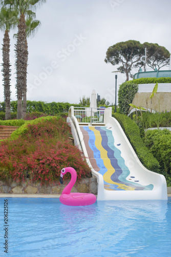  inflatable pink flamingo in pool