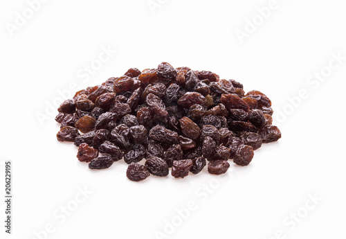 dried raisins isolated on white