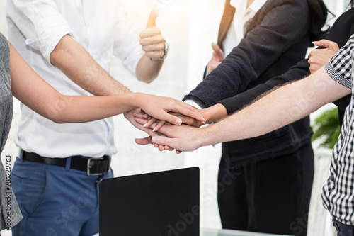Business team touching hand together for success target in business teamwork,Business Teamwork concept © 220 Selfmade studio