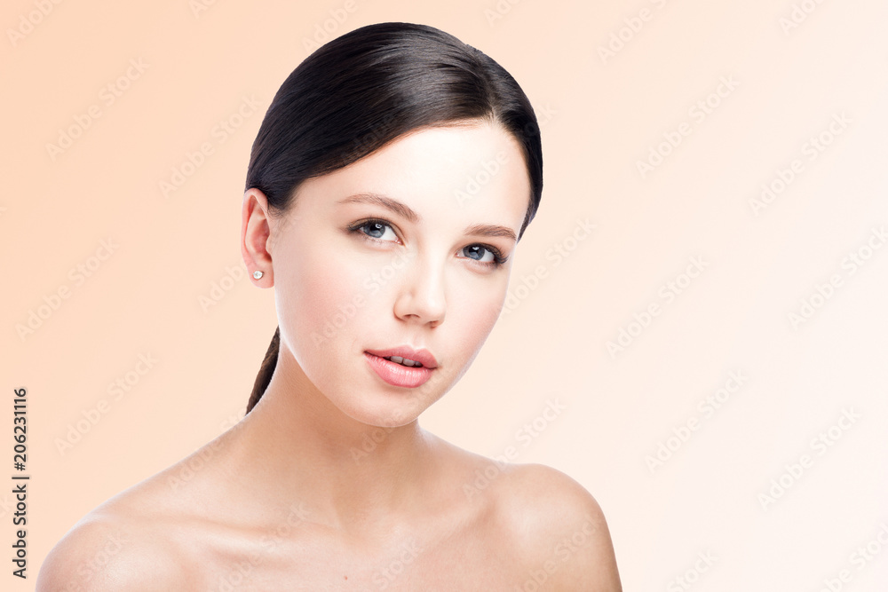 Beauty portrait of a beautiful young woman. Tender look. Perfect makeup Beauty portrait of a beautiful young woman. Tender look. Perfect makeup