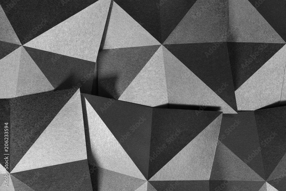 Geometric shapes of paper in black and white, grainy paper texture Geometric shapes of paper in black and white, grainy paper texture