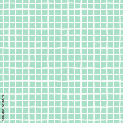 Checked, square, plaid, lattice, granting vector seamless pattern. Vertical and horizontal hand drawn uneven crossing stripes. Chequered geometrical background. White bars on mint green backdrop.