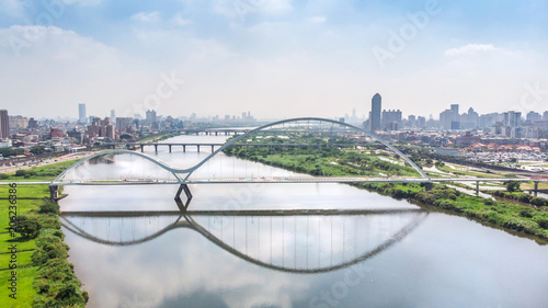 Canvas Print Crescent Bridge - landmark of New Taipei, Taiwan with beautiful illumination at day, aerial photography in New Taipei, Taiwan