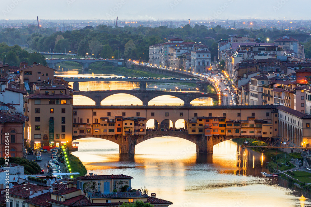 Fototapeta Ponte Vecchio bridge over the Arno River in Florence with floodlight