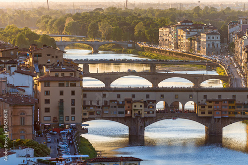 Ponte Vecchio Bridge and the River Arno in Florence at sunset