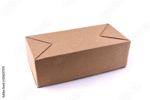 Closed cardboard box isolated on white background