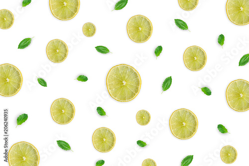 Raw material with lemon slice, basil leaves on white background.