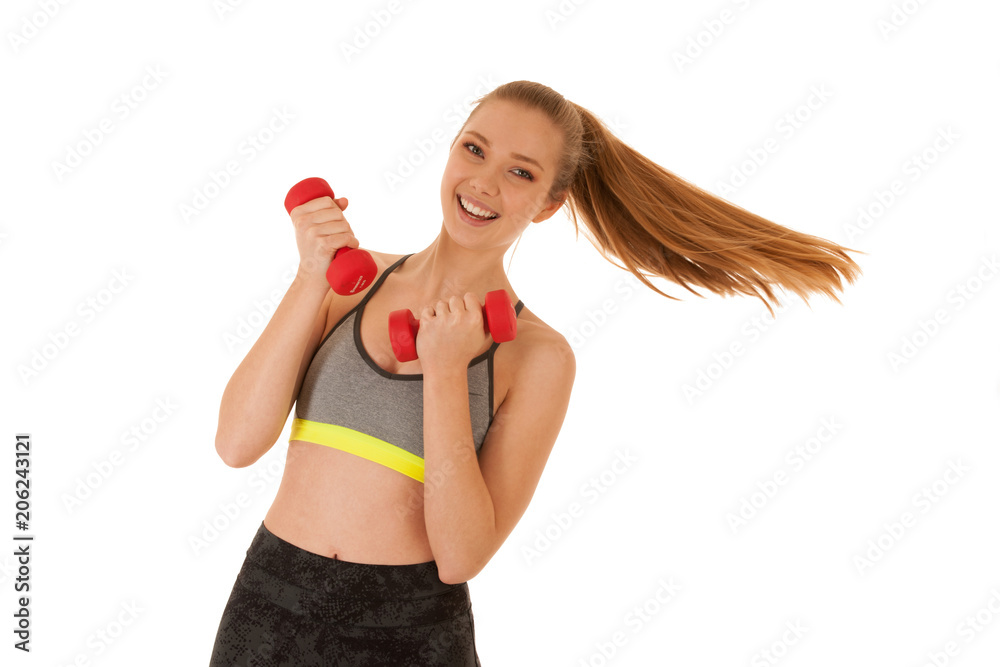 Beautiful young fit woman works out with dumbbells isolated over white background Beautiful young fit woman works out with dumbbells isolated over white background