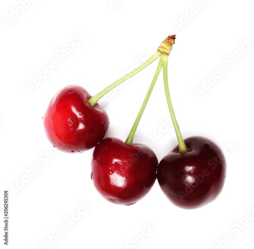 Cherries isolated on white background, top view