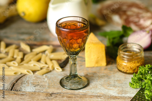 liqueur in a glass on a wooden table (wine) - (celebration) - drink cuisine. Food background