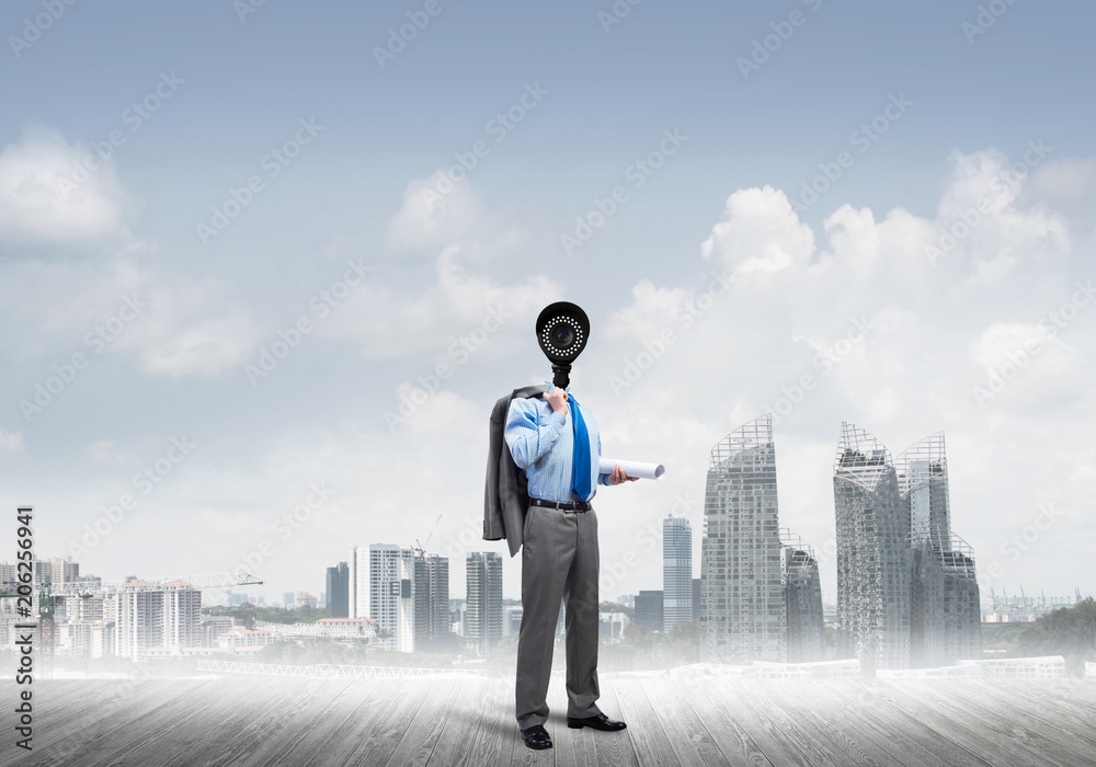 Concept of security and privacy protection with camera headed man Concept of security and privacy protection with camera headed man