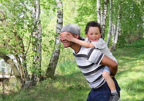 father and son piggyback