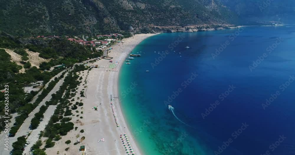 Aerial. Flying above Oludeniz beach. Beautiful Bay with crystal water. Turkey. 4K. Aerial. Flying above Oludeniz beach. Beautiful Bay with crystal water. Turkey. 4K.