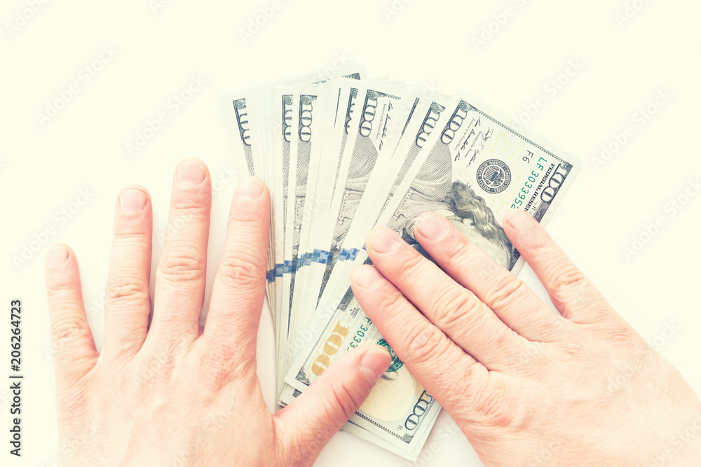 American currency, hundred dollar banknotes on a background. American currency, hundred dollar banknotes on a background.