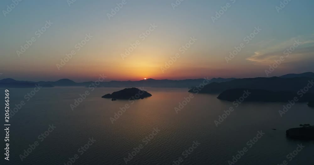 Aerial. Camera flies above sea during golden and orange sunset. 4K Aerial. Camera flies above sea during golden and orange sunset. 4K