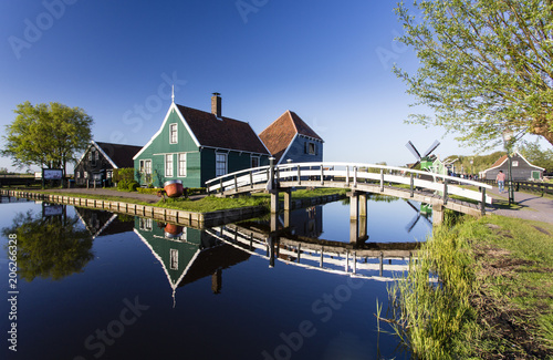 Historic windmills and houses of Zaanse Schans at Amsterdam,  Netherlands photo