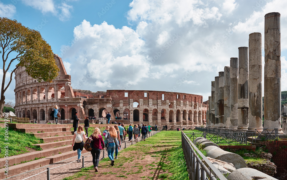 Fototapeta premium Colosseum, tourists visit the archaeological site