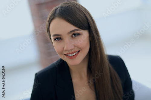 close up portrait of young  business woman in modern office
