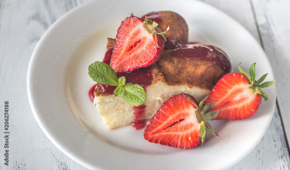 Slice of cheesecake with fresh strawberries Slice of cheesecake with fresh strawberries