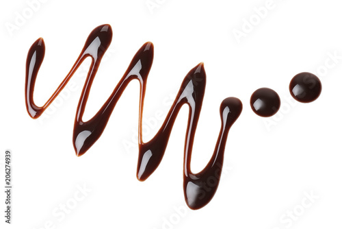 Pattern made of melted chocolate on white background