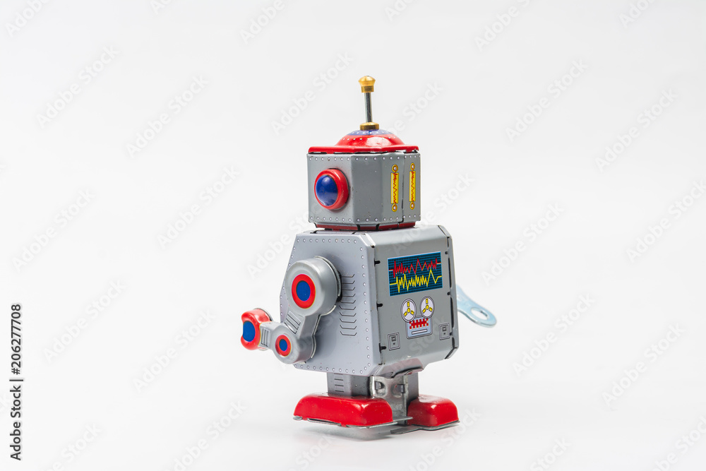 Fototapeta premium robot tin toy on white background